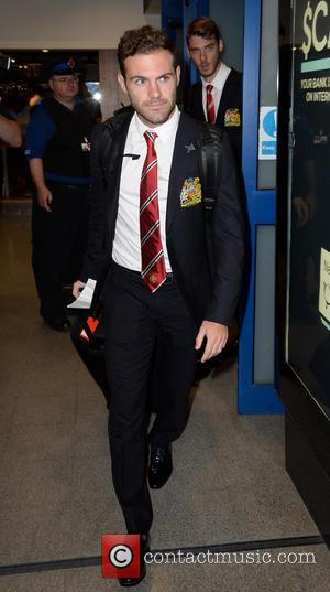 Juan Mata - Manchester United Players arrive at Manchester Airport while a boax hoax drama was unfolding. - Manchester, United...