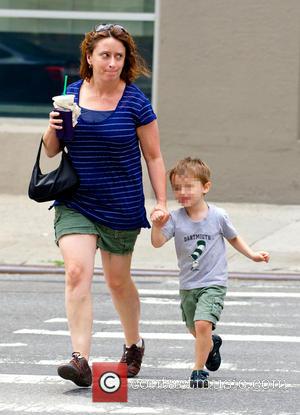 Rachel Dratch and Eli Benjamin Wahl - Rachel Dratch, carrying a Starbucks iced coffee, spotted with her son Eli Benjamin...
