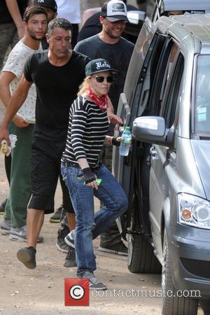 Madonna - Madonna enjoys a game of paintball with her boyfriend and children on a family holiday near Cannes in...