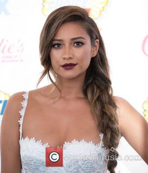 Shay Mitchell - Celebrities attend the 2014 Teen Choice Awards at The Shrine Auditorium - Arrivals - Los Angeles, California,...