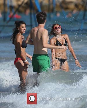 Lourdes Leon - Lourdes Leon, daughter of Madonna, spends time on the beach with friends during a summer holiday in...
