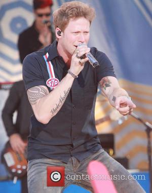 Brian Kelley from Florida Georgie Line - Florida Georgia Line performs live on the 'Good Morning America' 2014 Summer Concert...