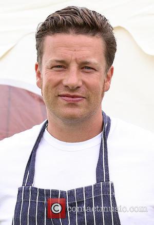 Jamie Oliver - Jamie Oliver films 'Jamie & Jimmy's Food Fight Club' in Hove - Brighton, United Kingdom - Thursday...