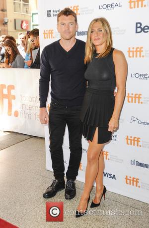 Jennifer Aniston and Sam Worthington - Stars of new film 'Cake' Jennifer Aniston and Sam Worthington photographed at the 2014...