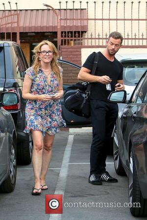 Lea Thompson and Artem Chigvintsev - Lea Thompson and dance partner Artem Chigvintsev leaving a dance studio after rehearsals for...