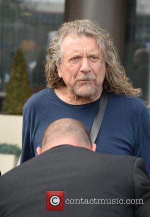 Robert Plant - Rocker Robert Plant literally let his hair down while leaving his Manchester hotel.  The Whole Lotta...