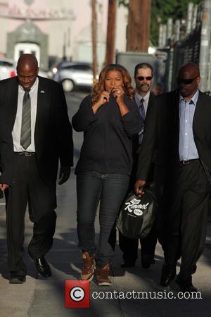 Queen Latifah - Queen Latifah covers her nose with her sweater as she arrives for her appearance on Jimmy Kimmel...