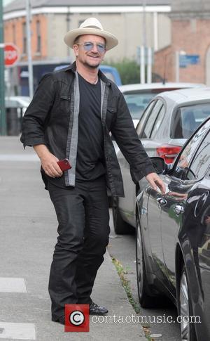 Bono - U2's Bono spotted walking to his car in Ballsbridge with what appears to be the new Apple iPhone...