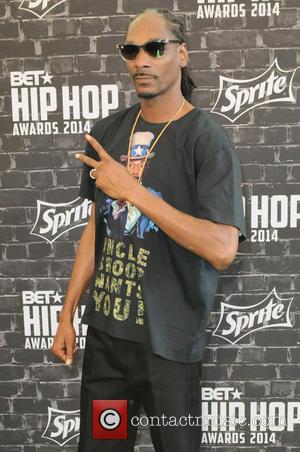 Snoop Lion and Snoop Dogg - A variety of hip hop stars were photographed as they arrived at the 2014...
