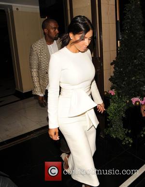 Kim Kardashian - Kim Kardashian and Kanye West leaving the...