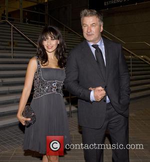 Alec Baldwin - Alec Baldwin and his wife attend the...