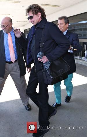 Barry Manilow - Barry Manilow arrives at Los Angeles International...