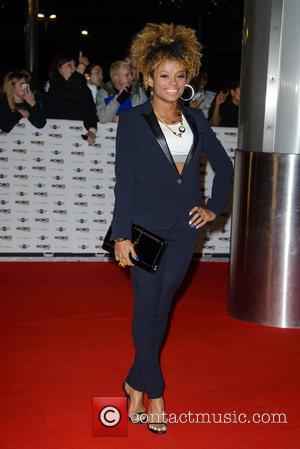 Fleur East - A variety of stars from the music industry attended the MOBO Awards 2014 which was held at...