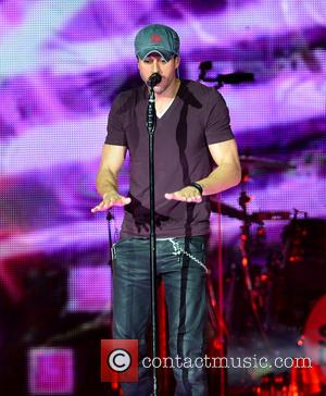 Enrique Iglesias - Enrique Iglesias and Pitbull perform at the American Airlines Arena with special guest J Balvin at American...