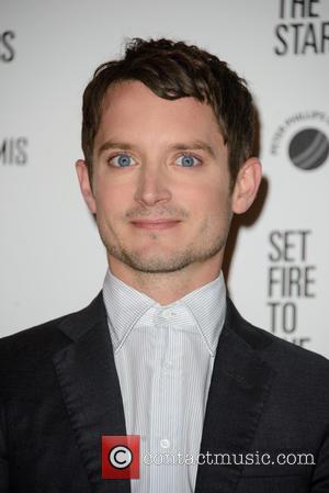 Elijah Wood - Stars were photographed as they attended the UK premiere of 'Set Fire to the Stars' The premiere...