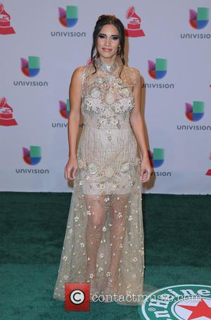 India Martinez - A host of celebrities were snapped as they took to the green carpet for the 2014 Latin...
