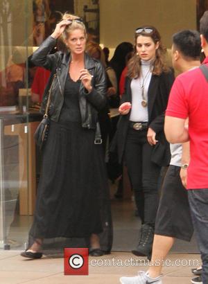 Rachel Hunter and Renee Stewart - Rachel Hunter goes shopping at The Grove in Hollywood dressed all in black with...