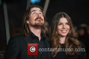  Christian Bale and Sibi Blazic - Photographs of a variety of celebrities as they took to the red carpet for...