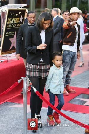 Pharrell Williams, Helen Lasichanh and Rocket Williams - American pop star Pharrell Williams was presented with a Hollywood walk of...