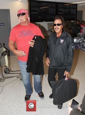Hulk Hogan and Jimmy Hart - Hulk Hogan and professional wrestling manager Jimmy Hart arrive at Los Angeles International Airport...