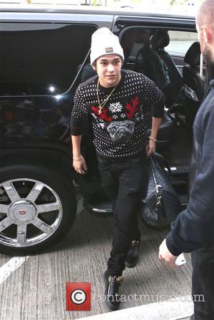 Austin Mahone - Austin Mahone departs from Los Angeles International Airport (LAX) - Los Angeles, California, United States - Friday...