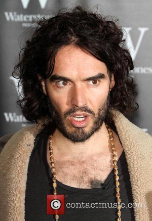 Russell Brand - Russell Brand signs copies of his new books 'Revolution' and 'The Pied Piper of Hamelin' at Waterstones,...