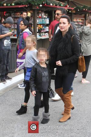 Kyle Richards - Kyle Richards takes her family shopping at The Grove in Hollywood - Los Angeles, California, United States...