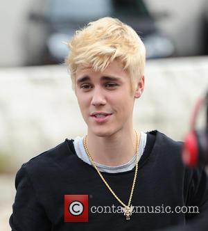 Justin Bieber - Justin Bieber meets and greets fans at West Coast Custom - Los Angeles, California, United States -...