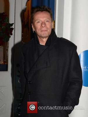 Larry Mullen - Photographed wearing a sling after his bicycle accident, U2 front man Bono managed to avoid the annual...