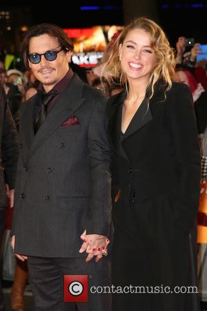 Johnny Depp and Amber Heard - The UK premiere of 'Mortdecai' held at the Empire cinema - Arrivals - London,...