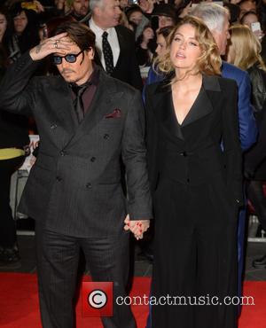 Johnny Depp and Amber Heard - 'Mortdecai' U.K. Premiere at the Empire, Leicester Square - Arrivals - London, United Kingdom...