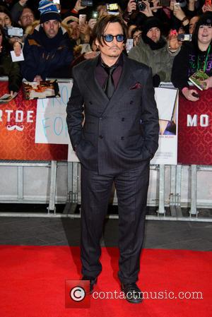 Johnny Depp - A host of stars were photographed as they attended the UK premiere of 'Mortdecai' which stars American...
