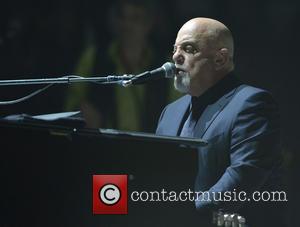 Shots of American singer songwriter Billy Joel as he gave a live performance at the American Airlines Arena in Miami,...