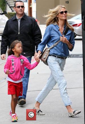 Heidi Klum and Lou Samuel - Heidi Klum and Seal watch their kids play soccer in Brentwood at soccer field...