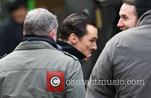 Benedict Cumberbatch - Benedict Cumberbatch and Martin Freeman film a scene for the 'Sherlock' christmas special in London - London,...