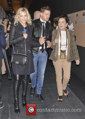Michael Buble and Luisana Lopilato - Mercedes-Benz Madrid Fashion Week Fall/Winter 2015 - Davidelfin - Arrivals - Madrid, Spain -...