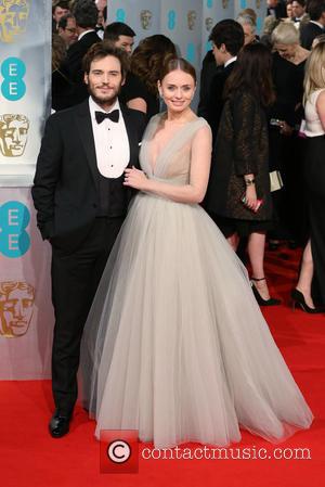 Sam Claflin and Laura Haddock - Various stars of film and television were photographed on the red carpet as they...