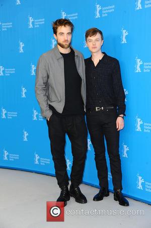 Robert Pattinson and Dan DeHaan - Shots of a host of stars as they attended a photocall at the 65th...