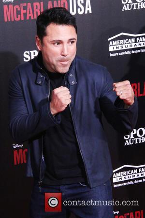 Oscar De La Hoya - A host of stars were photographed as they arrived at the world premiere of Disney's...