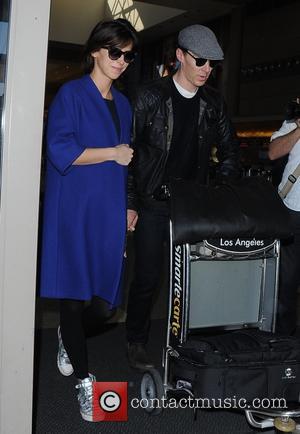 Benedict Cumberbatch and Sophie Hunter - Benedict Cumberbatch and his pregnant wife, Sophie Hunter arrive at Los Angeles International Airport...