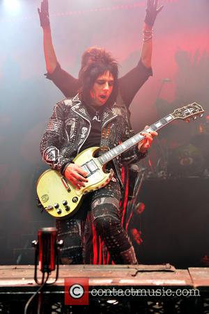 Alice Cooper and Tommy Henriksen - Shots of rock legend Alice Cooper as he performed live on stage at Hard...