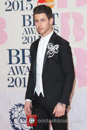 Nick Jonas - A variety of stars from the music industry were photographed as they arrived at the Brit Awards...