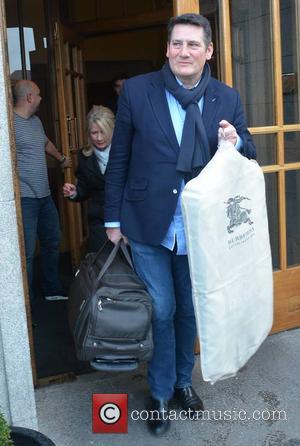 Tony Hadley & wife Alison Evers - Members of 80s new wave band Spandau Ballet seen leaving The Clarence Hotel...