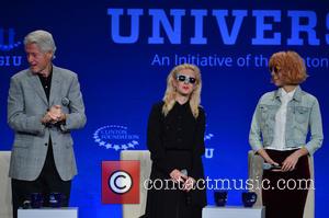 Former U.S. President Bill Clinton, Maria Alekhina and Nadezhda Tolokonnikova of Pussy Riot - The Clinton Global Initiative University -...