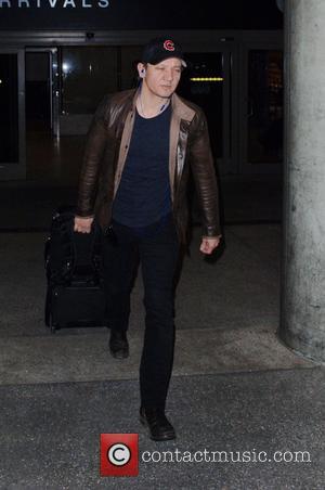 Jeremy Renner - Jeremy Renner arrives at LAX airport at LAX - Los Angeles, California, United States - Saturday 7th...