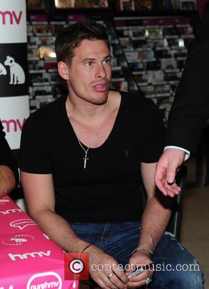Blue, Duncan James and Lee Ryan - Blue sign copies of their new album 'Colours' at HMV in Birmingham at...