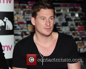 Blue and Lee Ryan - Blue sign copies of their new album 'Colours' at HMV in Birmingham at HMV Bullring...