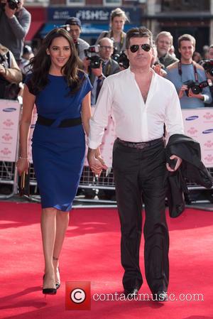 Lauren Silverman and Simon Cowell - A variety of stars were snapped as they took to the red carpet for...