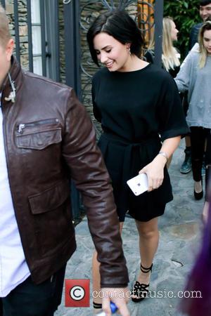 Demi Lovato - Former Disney star Demi Lovato leaving an event in West Hollywood at Disney - Los Angeles, California,...