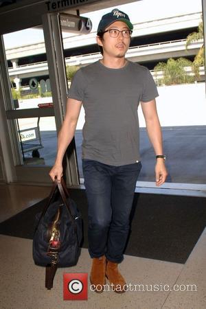 Steven Yeun - Steven Yeun arrives at Los Angeles International (LAX) airport to catch a flight at LAX - Los...